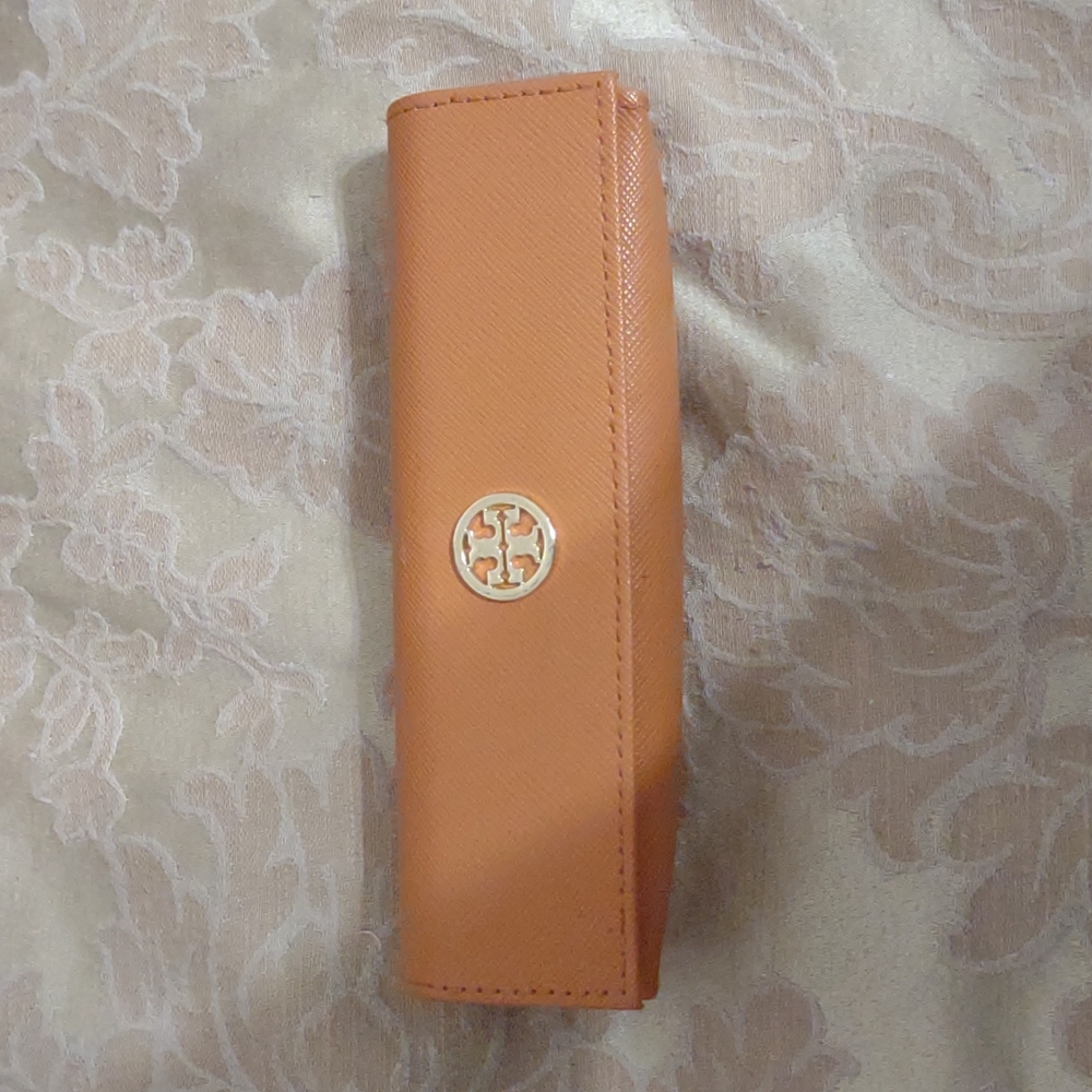 Tory Burch Eye glass case color Orange .